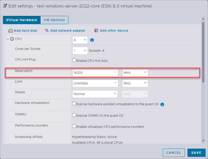 Screenshot: VMware ESXi Host Client with advanced virtual hardware settings and CPU reservation.